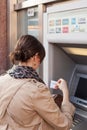 Girl withdrawing money from ATM