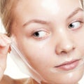 Girl woman in facial peel off mask. Skin care. Royalty Free Stock Photo