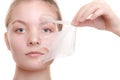 Girl woman in facial peel off mask. Skin care.
