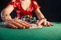The girl won cards in a casino and takes everything in dollars. Blackjack. poker. texas poker. gaming business