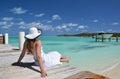 Girl on the wooden jetty