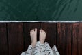 girl on a wooden pier