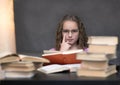 The girl wore glasses and reading a book Royalty Free Stock Photo