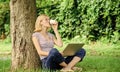 Girl work with laptop in park. Lunch time relax or coffee break. Work in summer park. Reasons why you should take your