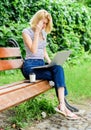 Girl work with laptop in park. Natural environment office. Education concept. Notebook internet remote job. Work in park Royalty Free Stock Photo