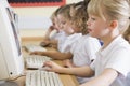 Girl working on a computer at primary school Royalty Free Stock Photo