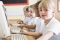 Girl working on a computer at primary school Royalty Free Stock Photo