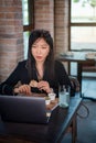 Girl working and having a meal Royalty Free Stock Photo
