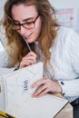 A girl working at her desk. Royalty Free Stock Photo