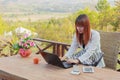 Girl working on her laptop computer outside Royalty Free Stock Photo