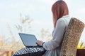 Girl working on her laptop computer outside Royalty Free Stock Photo