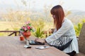 Girl working on her laptop computer outside Royalty Free Stock Photo