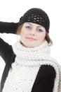 Girl in woven hat and knitted scarf