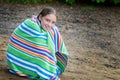 Girl wrapped in a beach towel