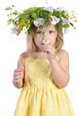 Girl with a wreath of flowers. Royalty Free Stock Photo