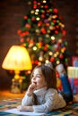 girl writes a letter to santa claus