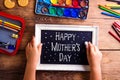 Girl writing with chalk on little board, Mothers day Royalty Free Stock Photo