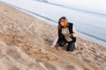 Girl Writing New Year in Sand Royalty Free Stock Photo