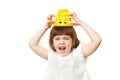 Girl 4-5 years angry in the game on a white background
