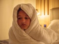 Girl of 12 years wrapped in a soft warm blanket Royalty Free Stock Photo