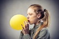 Girl with a yellow balloon Royalty Free Stock Photo