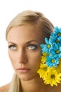 Girl and yellow and blue flower Royalty Free Stock Photo