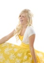 Girl in yellow dress winking Royalty Free Stock Photo