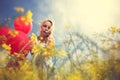 Girl in yellow field over sunny day Royalty Free Stock Photo