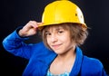 Girl with yellow hard hat Royalty Free Stock Photo