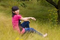 Girl and yellow weeds Royalty Free Stock Photo