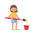 Girl, Young artist holds paint brush with paint Royalty Free Stock Photo
