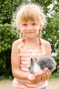Girl with young bunny rabbit Royalty Free Stock Photo