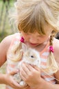 Girl with young bunny rabbit Royalty Free Stock Photo