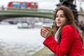 Woman Drinking Coffee by Westminster Bridge, London, England Royalty Free Stock Photo