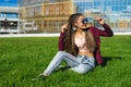 Girl with zizi cornrows dreads listening to music