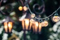 Girland at Christmas market, Christmas tree background, selective focus, Riga, Latvia Royalty Free Stock Photo