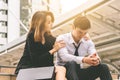 girlfriend is giving Consolation to a stressed boy friend office