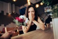 Woman Receiving Flowers Having an Allergic Reaction Royalty Free Stock Photo