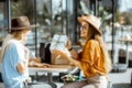 Girlfriends on the cafe terrace Royalty Free Stock Photo