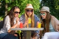 girlfriends enjoying cocktails in an outdoor cafe, friendship concept Royalty Free Stock Photo
