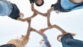 The girlfriends join the wrists in the center making a circle shape. Royalty Free Stock Photo