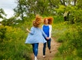 Girlfriends walking hand in hand