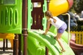 Girlie climbing on jungle gym