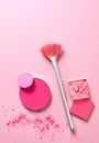 Girlish cosmetics on pink