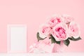 Girlish gentle Valentine days interior - blank frame for text, exquisite pink roses, gift box, heart with ribbon and bow on wood. Royalty Free Stock Photo