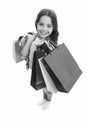 Girlish happiness. Kid girl happy smiling face carries bunch packages white background. Birthday girl concept. Girl