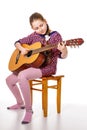 Girll teenager playing a guitar