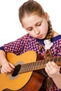 Girll teenager playing a guitar