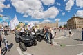 Girls advertise ATVs off-road at the exhibition of motorcycles u