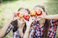 Girls with Apple in the Apple Orchard Royalty Free Stock Photo